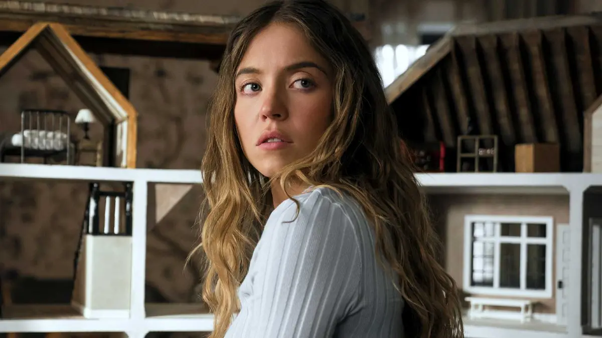 Sydney Sweeney looks over her shoulder in The Housemaid