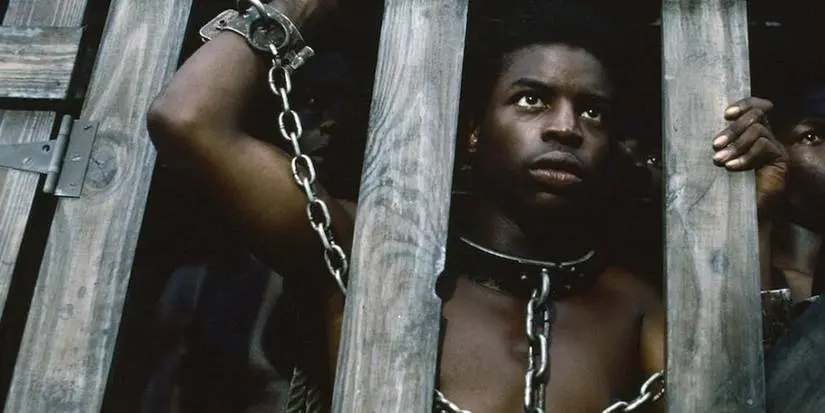 Kunta Kinte in chains in Roots