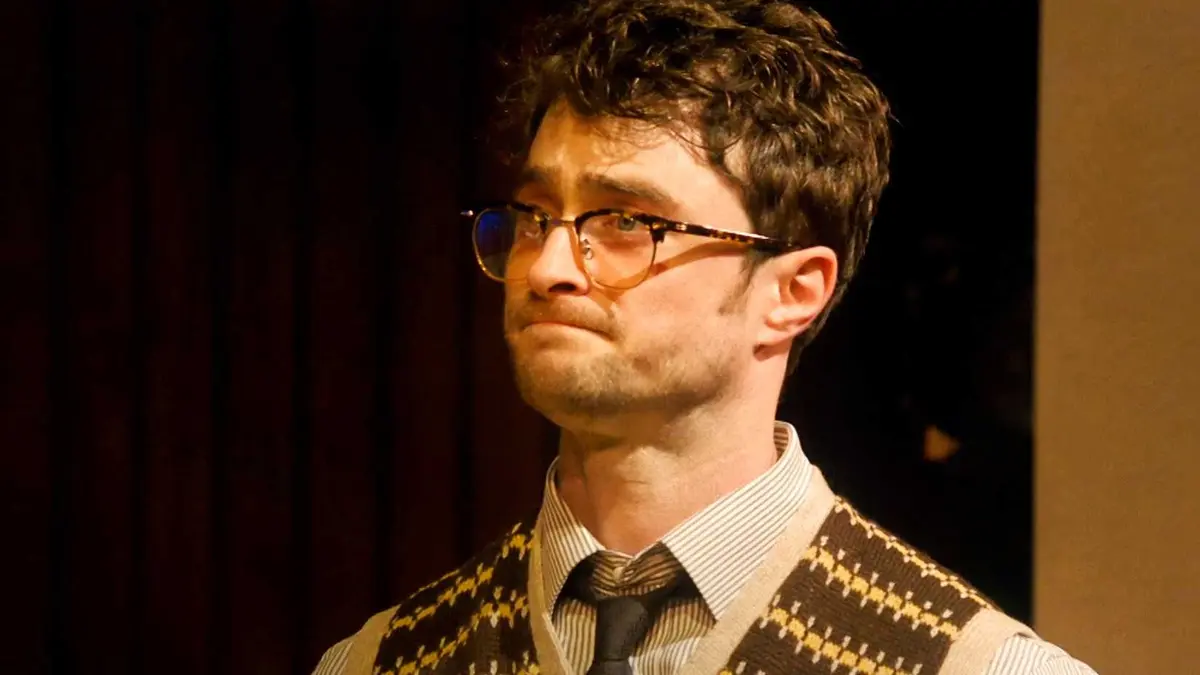 Daniel Radcliffe looks to the side in the Merrily We Roll Along proshot