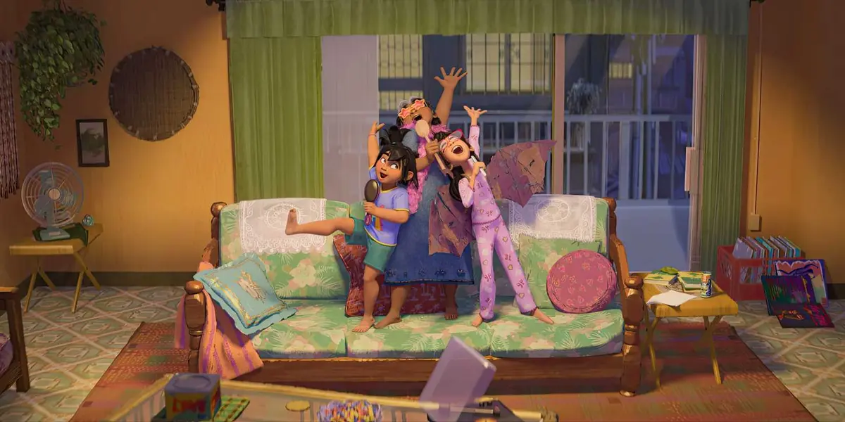 Jo, Lola Fatima and Raissa standing on the couch and singing in Forgotten Island.