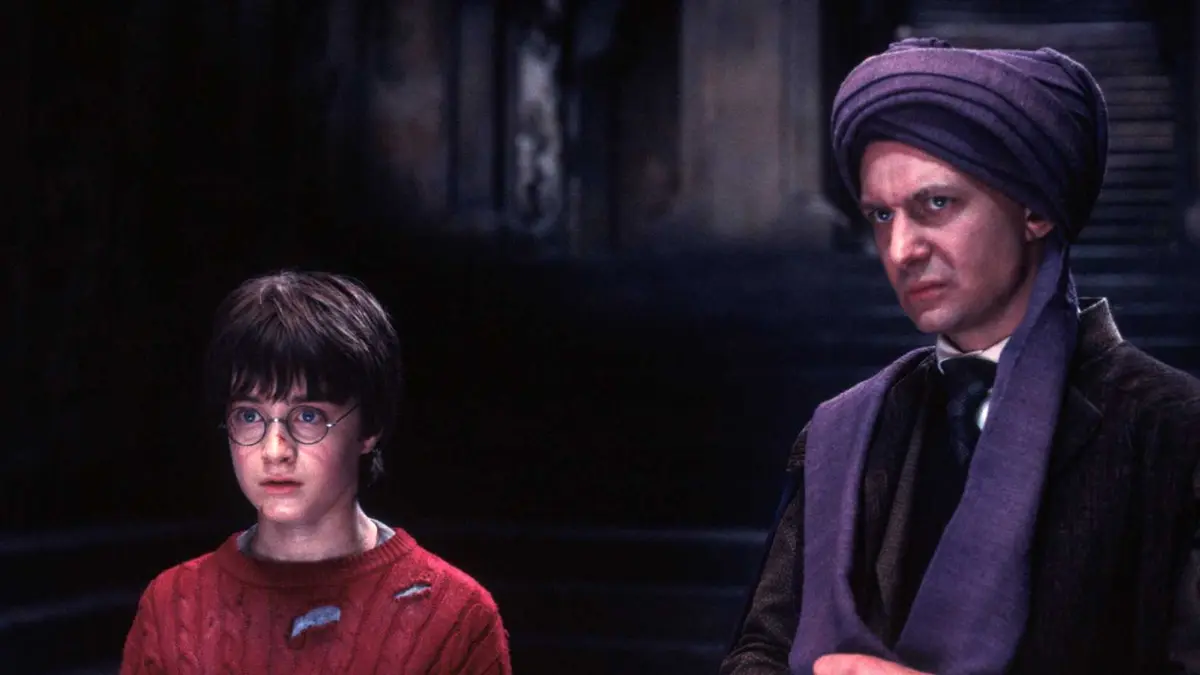 Daniel Radcliffe and Ian Hart in Harry Potter and the Philosopher's Stone