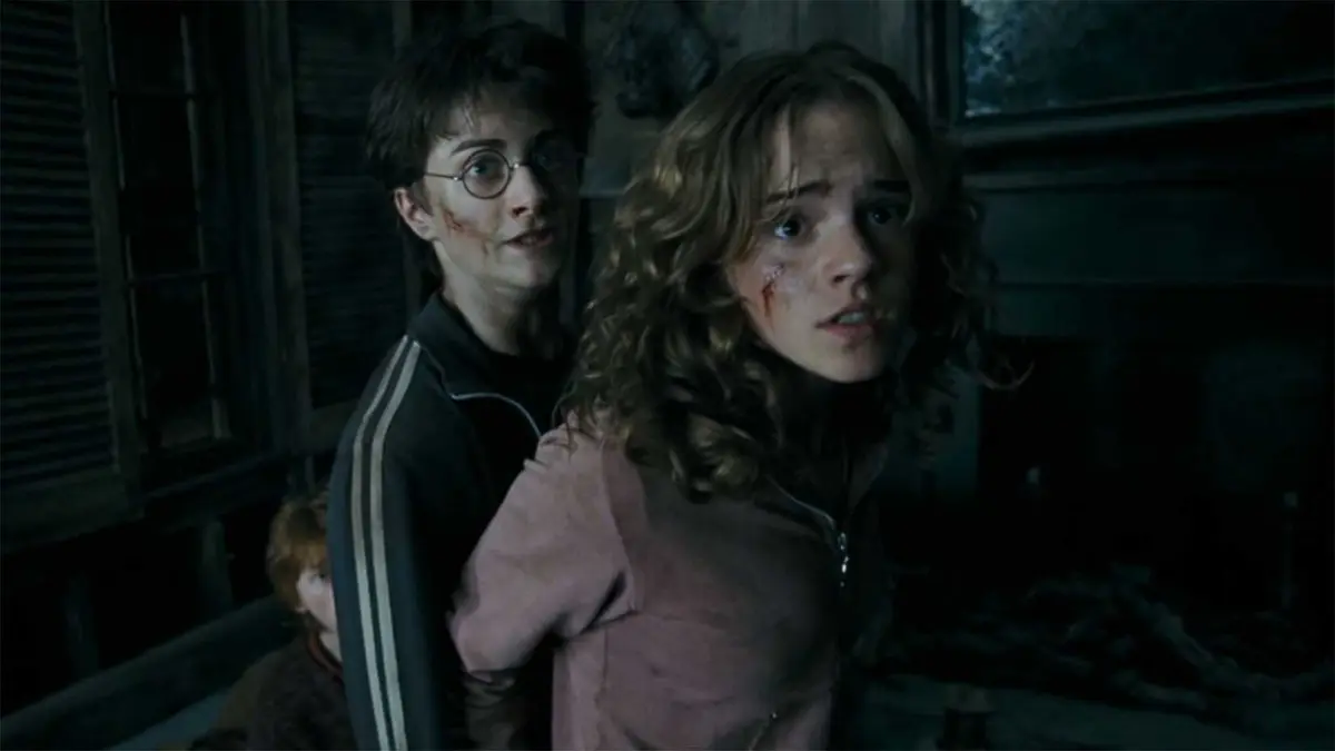 Hermione shielding Harry in Harry Potter and the Prisoner of Azkaban