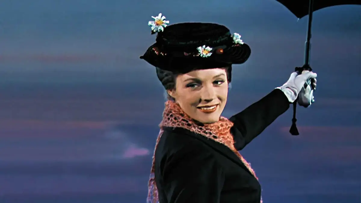 Mary Poppins smiles as she flies away in Mary Poppins.