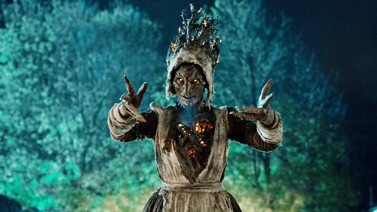 A burning monster with its hands raised in Guillermo del Toro’s Cabinet of Curiosities