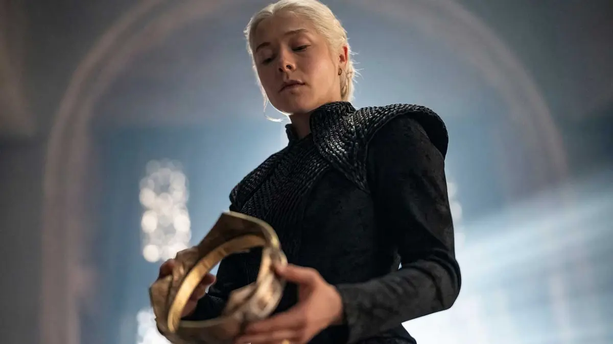 Rhaenyra looking down at her crown in House of the Dragon