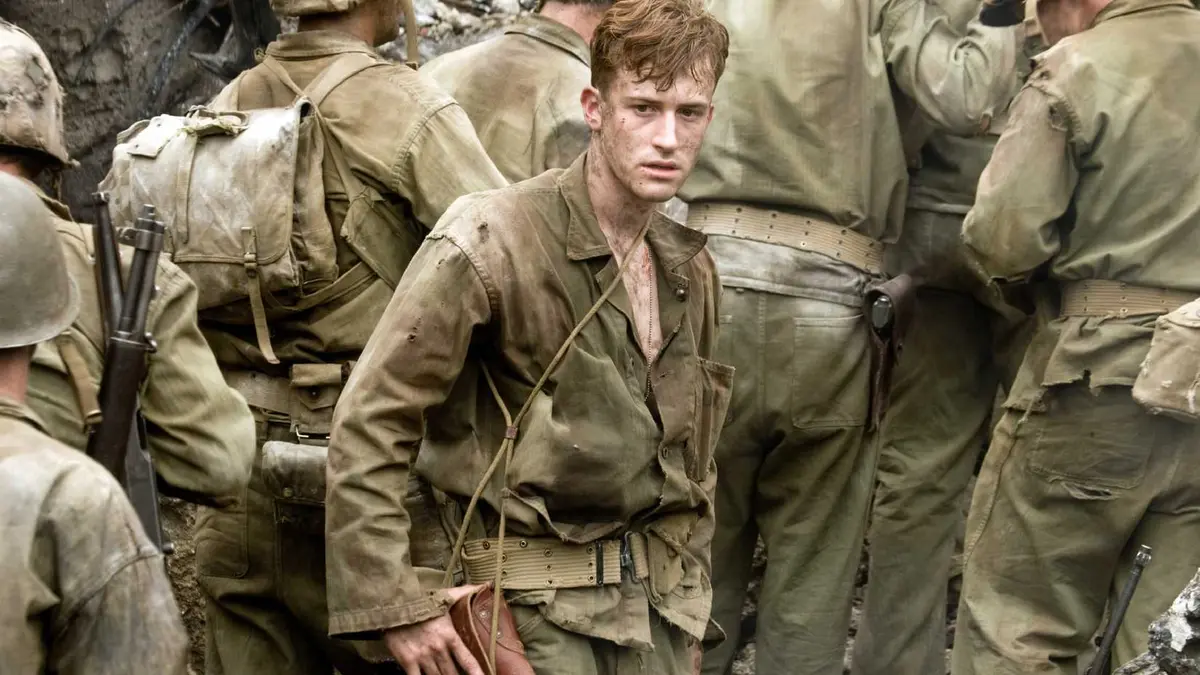 Sledge (Joseph Mazzello) looks distraught in a trench in The Pacific.