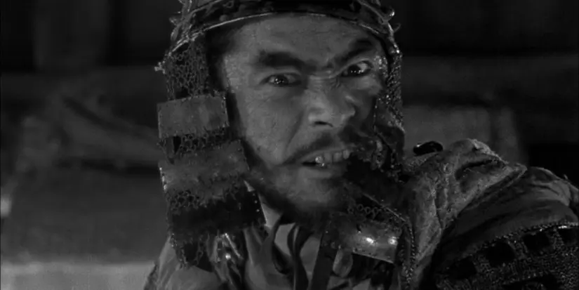 Kikuchiyo (Toshiro Mifune) looks aggressive in Seven Samurai.