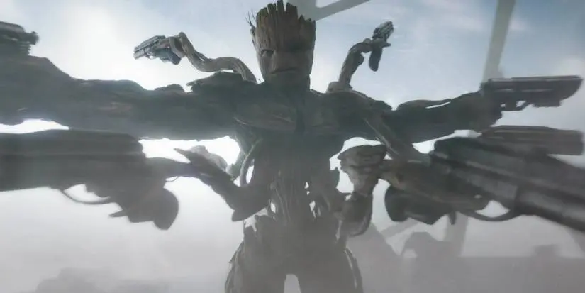 Groot wielding multiple guns in Guardians of the galaxy Vol. 3