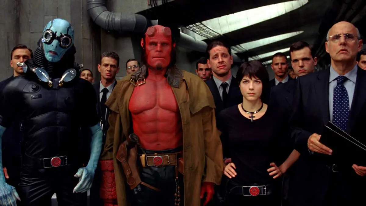 A group of humans and monsters in Hellboy (2004).