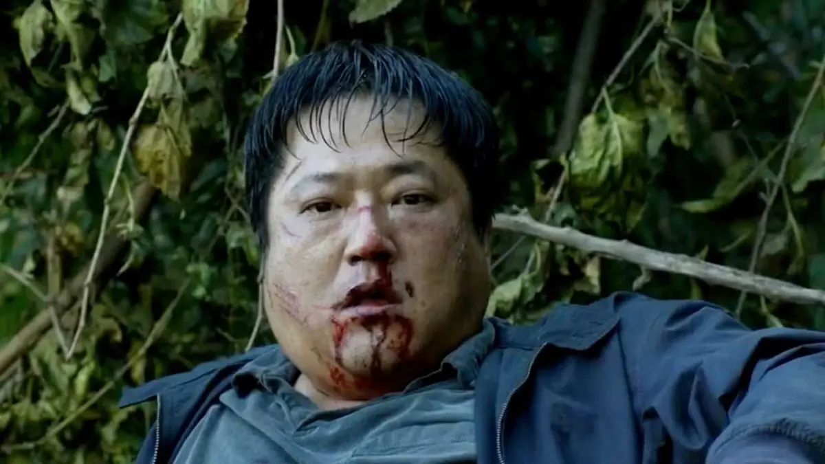 A scared and bloodied man in The Wailing