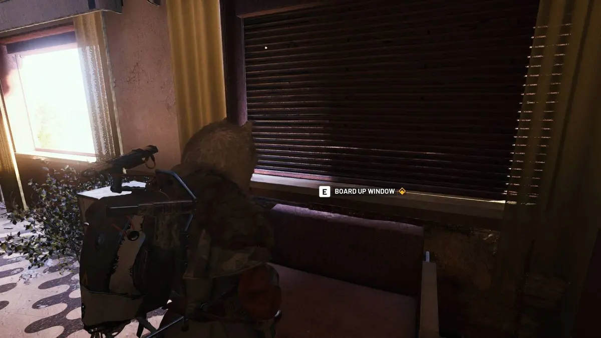 The player in Arc Raiders standing in front of the objective to board up the windows in the hotel.