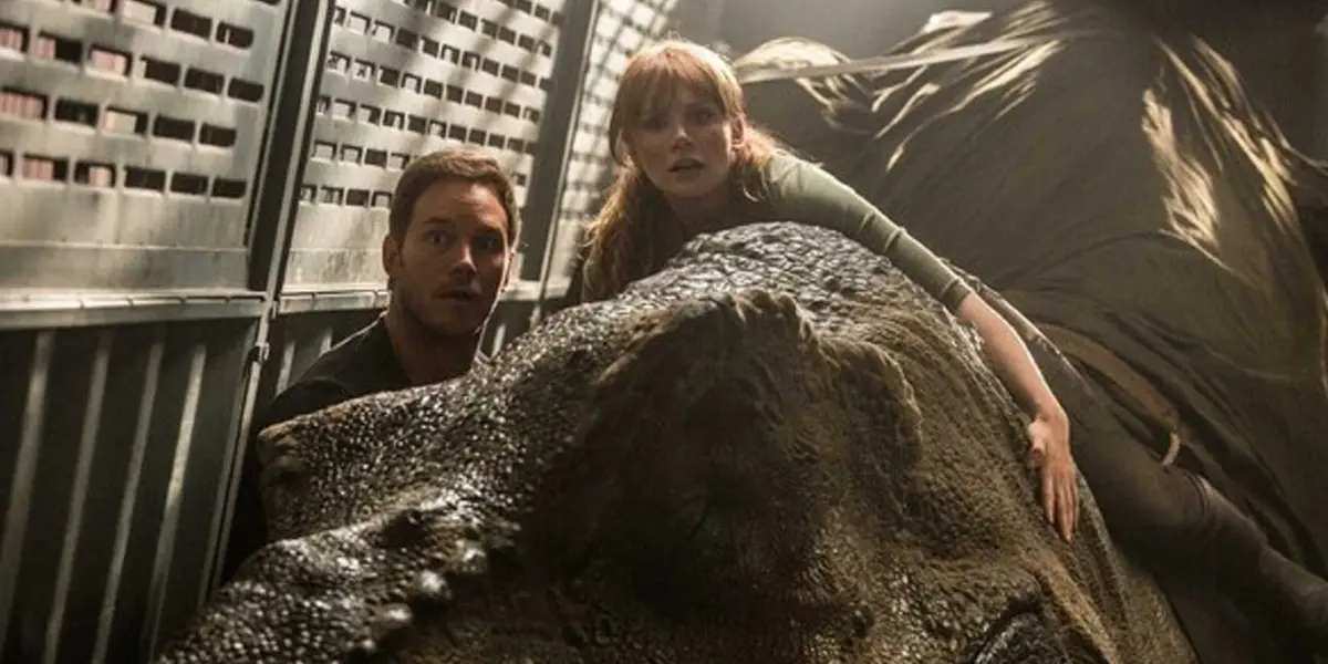 Owen and Claire with a t-rex in Jurassic World Fallen Kingdom