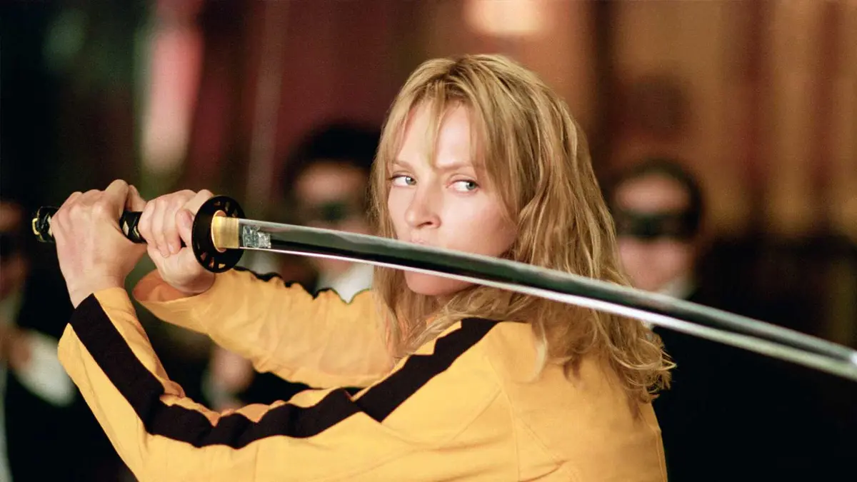 The Bride holds a sword in Kill Bill