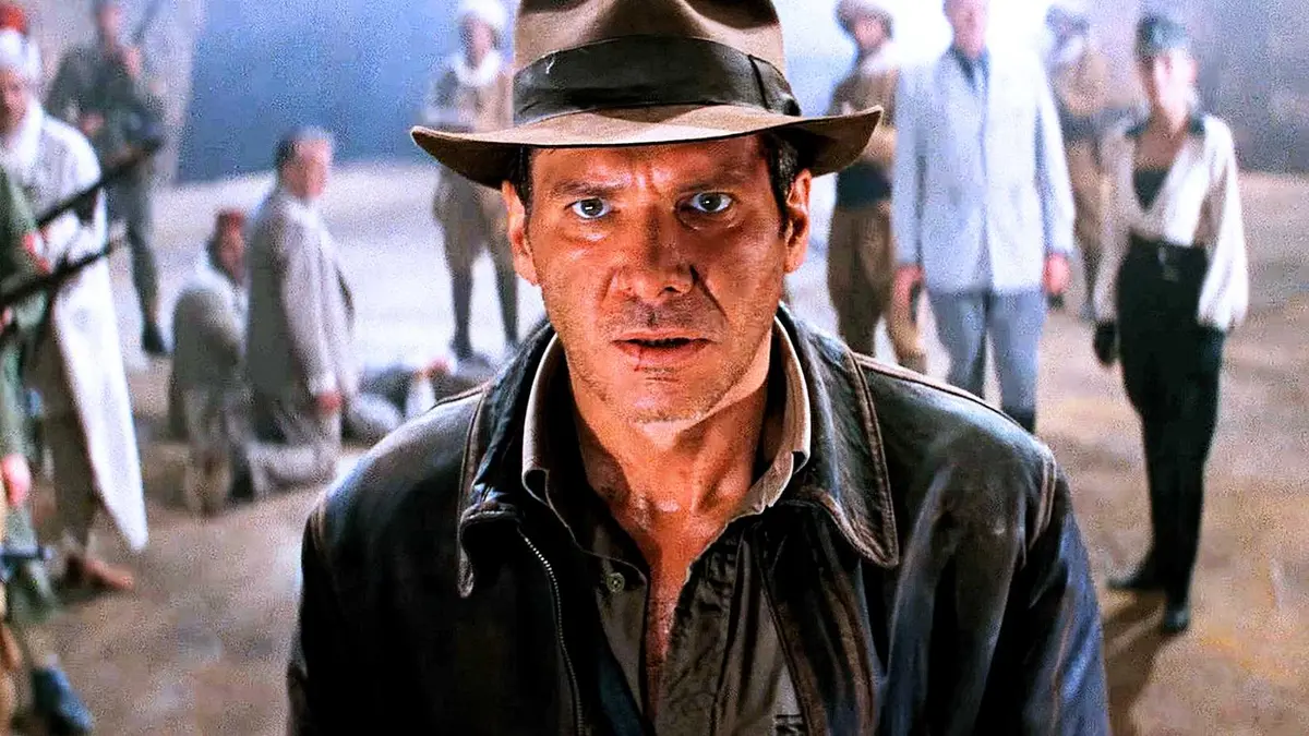 Indiana Jones close up with a crowd behind from The Last Crusade