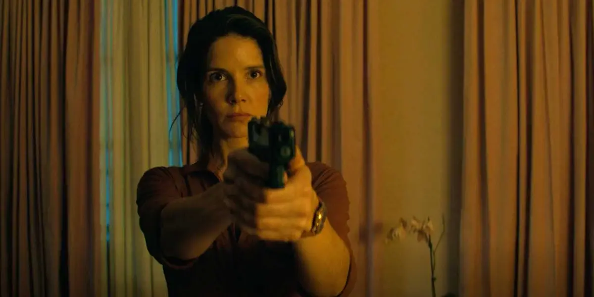 Agent Duffy points a gun in Reacher's season 3 finale